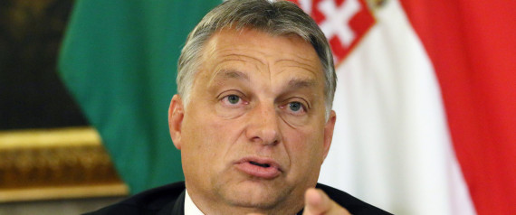 Hungarian Prime Minister Viktor Orban addresses the media on the occasion of a meeting with Austrian Chancellor Werner Faymann and Vice Chancellor Reinhold Mitterlehner at the Hungarian Embassy in Vienna, Austria, Friday, Sept. 25, 2015. (AP Photo/Ronald Zak)